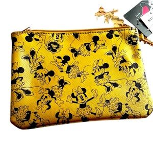 Walt Disney Minnie Mouse Shiny Gold Wristlet & Gold Minnie Charm. New with Tags.
